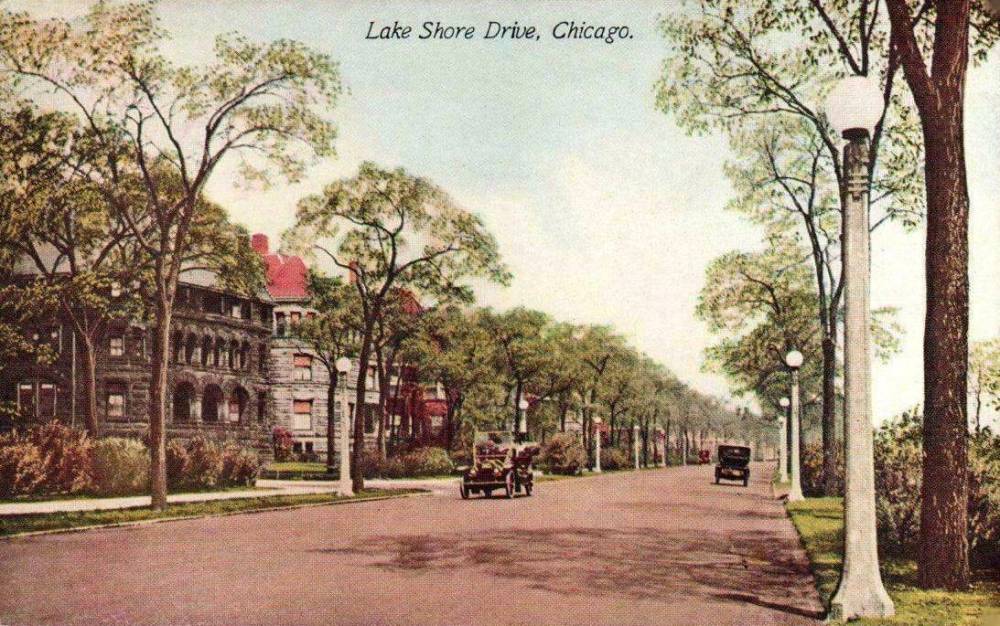 A POSTCARD - CHICAGO - LAKE SHORE DRIVE - GROUND LEVEL - MANSIONS - TWO CARS - NOTE STREET LIGHTS - TINTED - 1910s