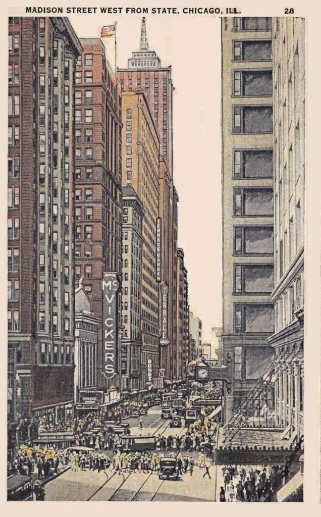 A POSTCARD - CHICAGO - MADISON STREET - LOOKING W FROM STATE STREET - ELEVATED - MCVICKERS THEATER - STATE MADISON BUIDING WITH CLOCK - PART OF SERIES FOR CENTURY OF PROGRESS WORLD'S FAIR - TINTED - 1933