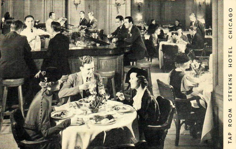 A POSTCARD - CHICAGO - THE TAP ROOM - STEVENS HOTEL - PEOPLE AT TABLES AND BAR - LOOKS LIKE A MOVIE SCENE - c1940